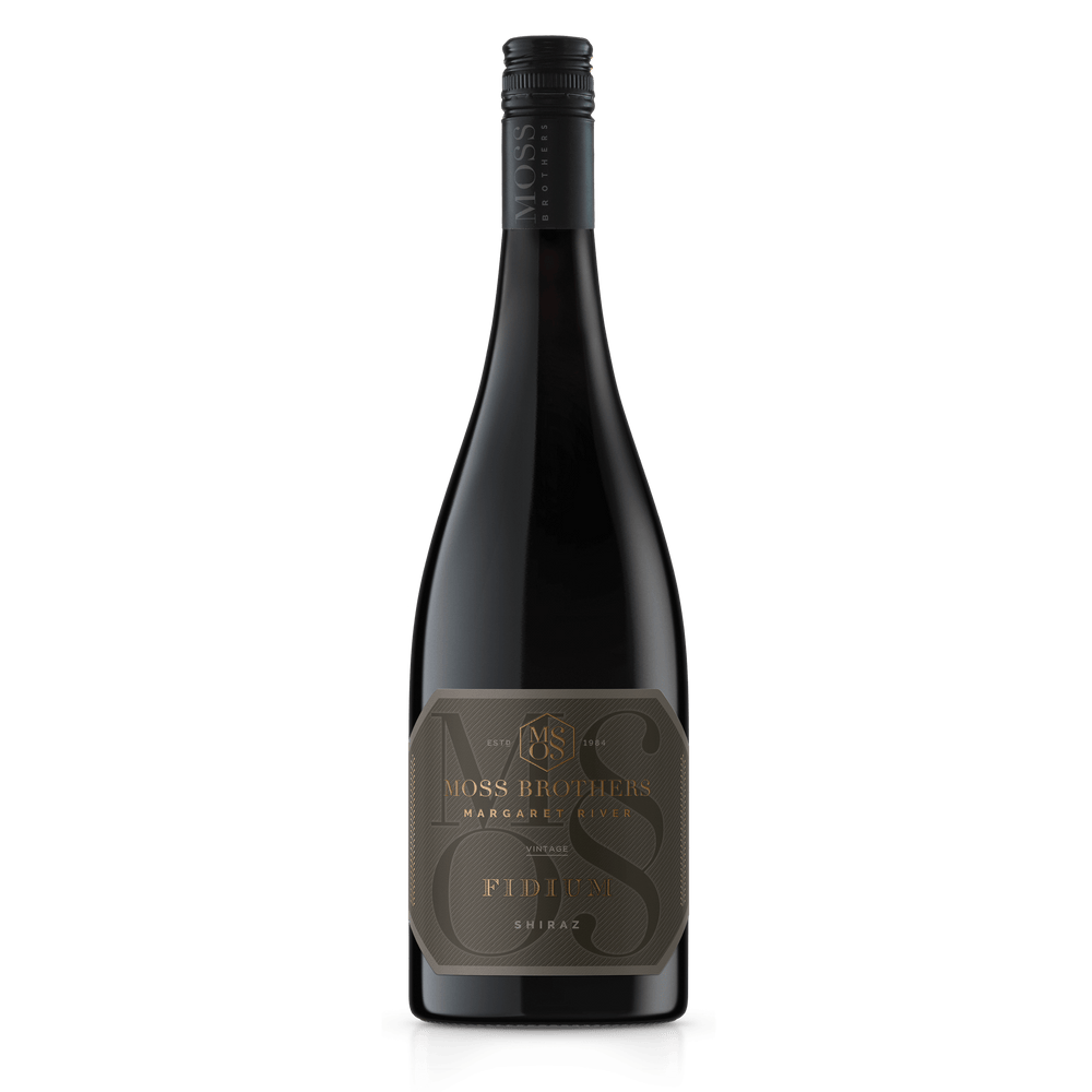 A Shiraz bottle from Margaret River with a black cap and black label with a beautiful foiled writing of Fidium in gold for Moss Brothers wines