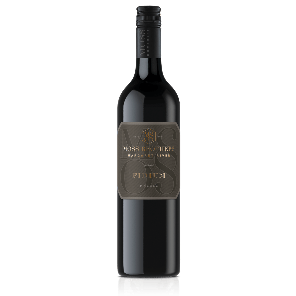 A Malbec bottle from Margaret River with a black cap and black label with a beautiful foiled writing of Fidium in gold for Moss Brothers wines